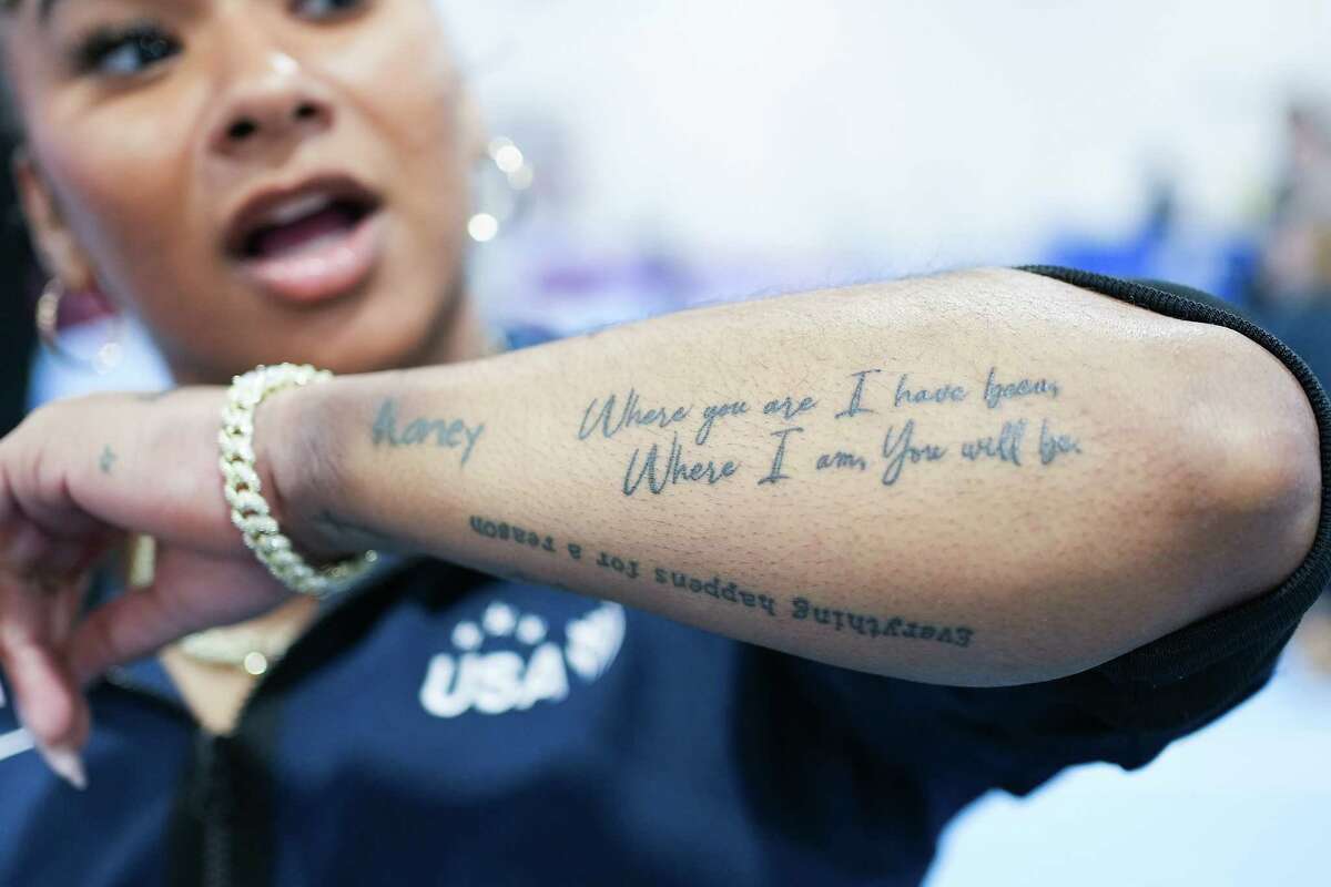 U.S. gymnast Jordan Chiles shows off a tattoo she got in honor of her grandfather during media interviews at Stars Gymnastics Training Center on Sunday, Feb. 4, 2024 in Katy.