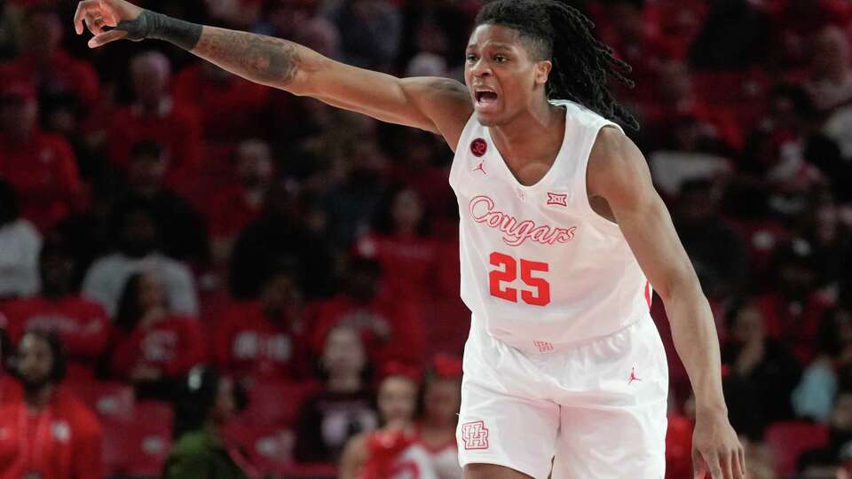 Houston Cougars forward Joseph Tugler (25) shouts directions during the first half of an NCAA college basketball game at the Fertitta Center, Tuesday, Feb. 6, 2024, in Houston.