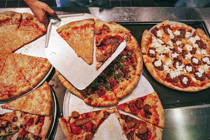 Down an unmarked hallway on the Vegas Strip, $6.50 secret pizza awaits