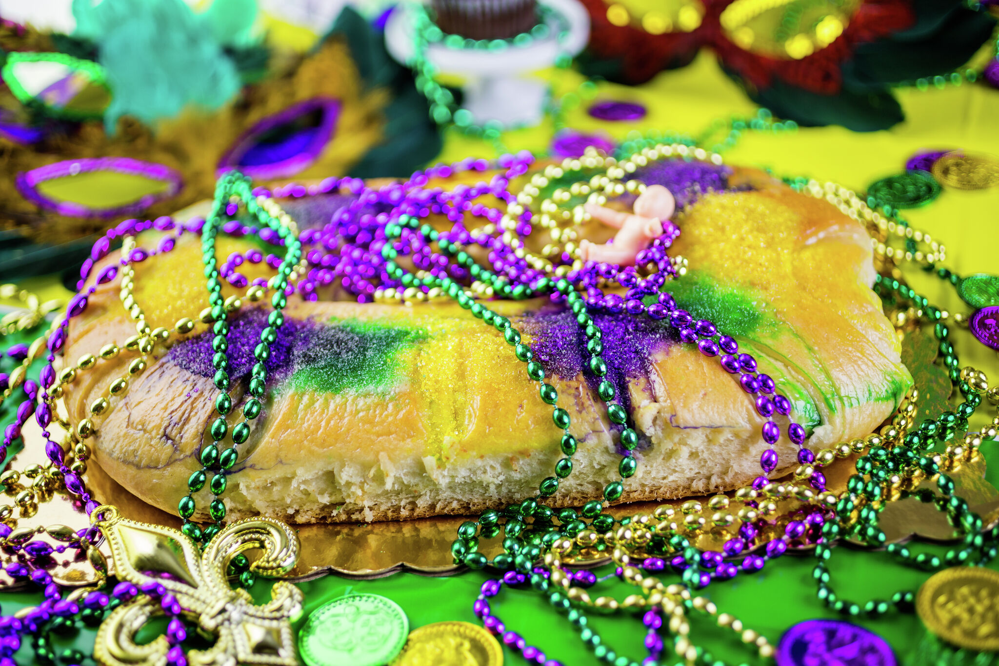 King Cake baby A symbol of luck and prosperity in Mardi Gras