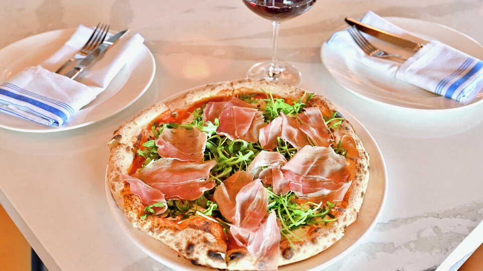 New restaurant Magdalena's Trattoria and Pizzeria serves brick-oven pizzas.