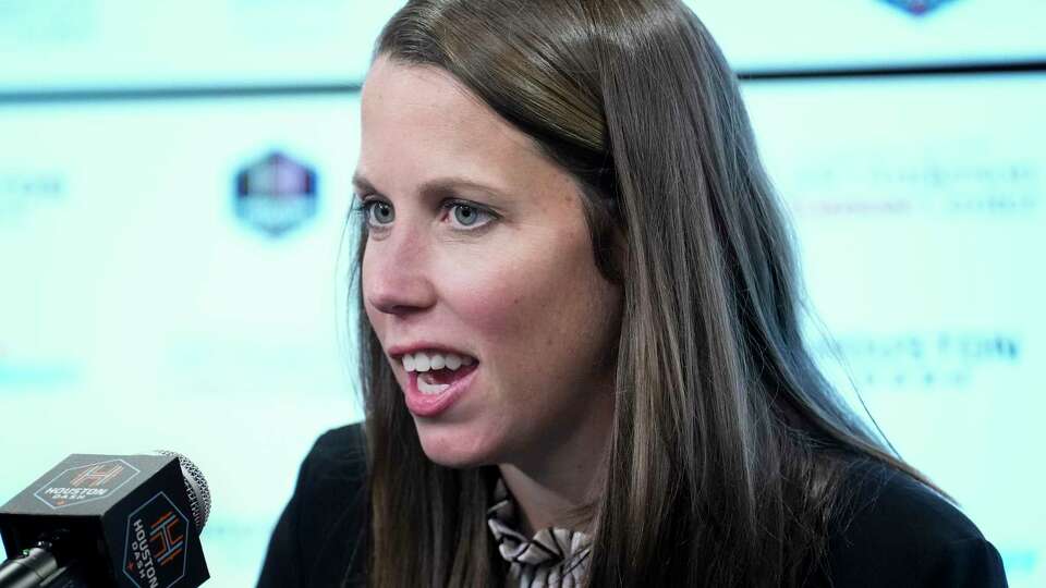 Houston Dash President Jessica O'Neill introducing new head coach Fran Alonso during a press conference on Tuesday, Feb. 13, 2024 at Shell Energy Stadium in Houston.