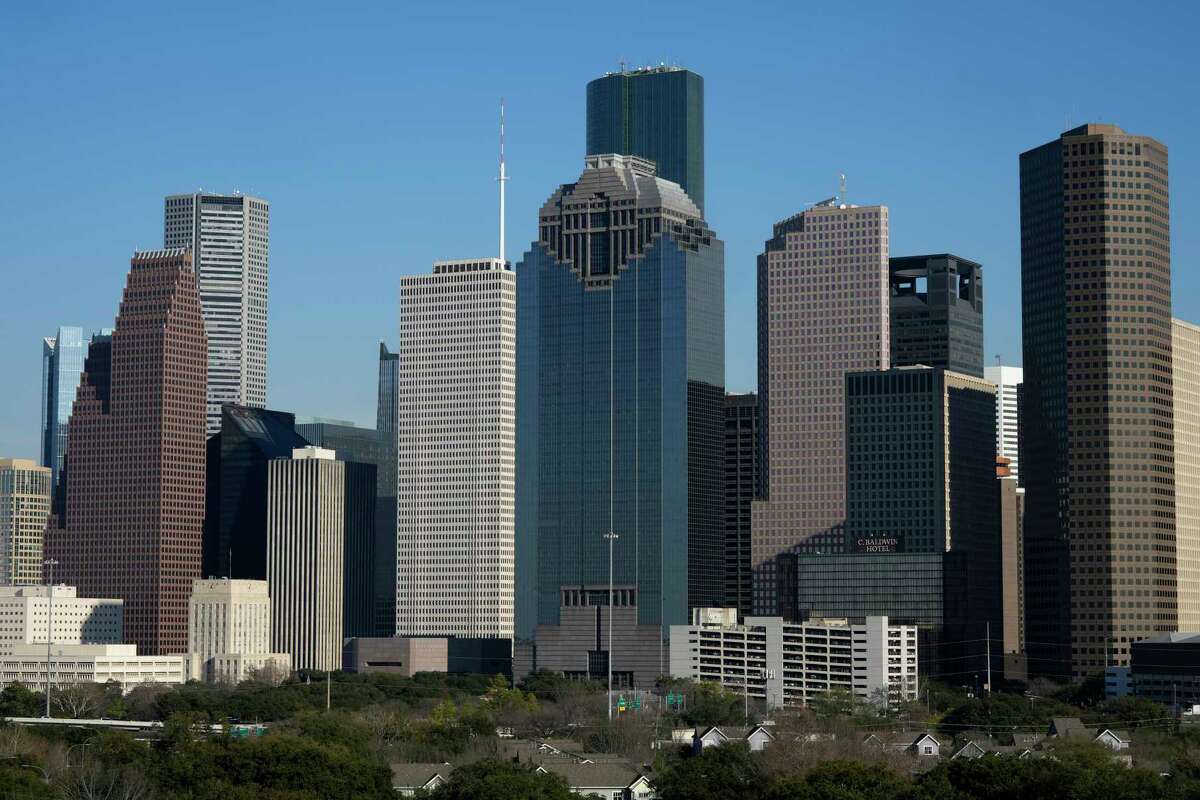 Downtown Houston skyline is photographed on Tuesday, Feb. 13, 2024 at the Thompson Hotel in Houston.