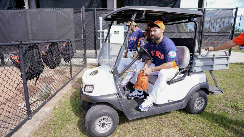 Houston Astros pitcher Jose Urquidy (65) sits in a golf cart waiting for Framber Valdez to throw off the 10-pack during workouts for Houston Astros pitchers and catchers at CACTI Park of the Palm Beaches on Thursday, Feb. 15, 2024, in West Palm Beach, Fl.