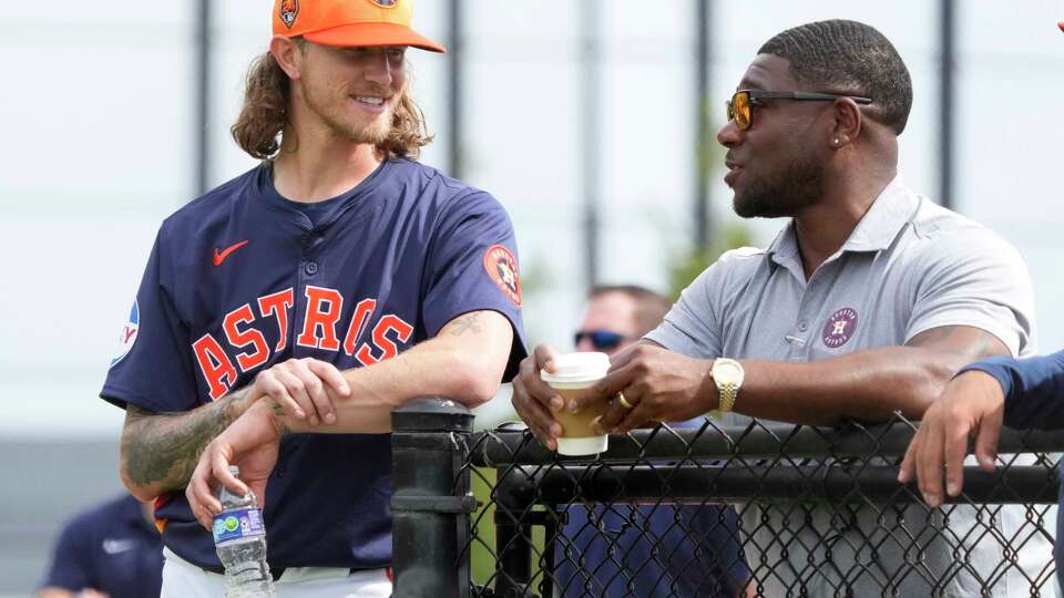 Houston Astros pitcher Josh Hader (71) chats with assistant GM Gavin Dickey during workouts for Houston Astros pitchers and catchers at CACTI Park of the Palm Beaches on Friday, Feb. 16, 2024, in West Palm Beach, Fl.
