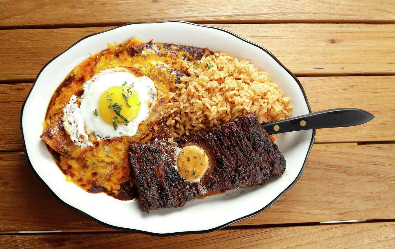 Tampiquena: marinated wood-grilled skirt steak, two cheese enchiladas topped with a fried egg, Mexican rice available at Superica. Atlanta restaurateur Ford Fry has opened two new restaurants in Houston and they are side-by-side. Photographed, Thursday, September 27, 2018, in Houston.