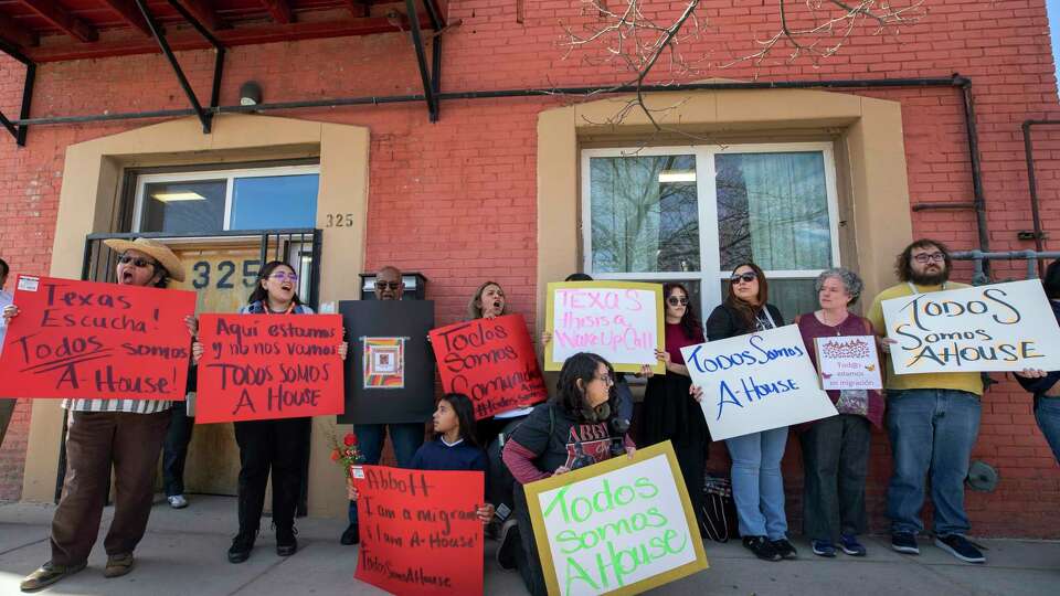 Local residents demonstrate their support for Annunciation House, a network of migrants shelters in El Paso, Texas, Friday, Feb. 23, 2024. Texas Attorney General Ken Paxton filed a lawsuit claiming the Annunciation House 'appears to be engaged in the business of human smuggling' and is threatening to terminate the nonprofit's right to operate in Texas.