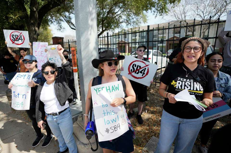 Houston rodeo protesters rally against new Texas immigration law