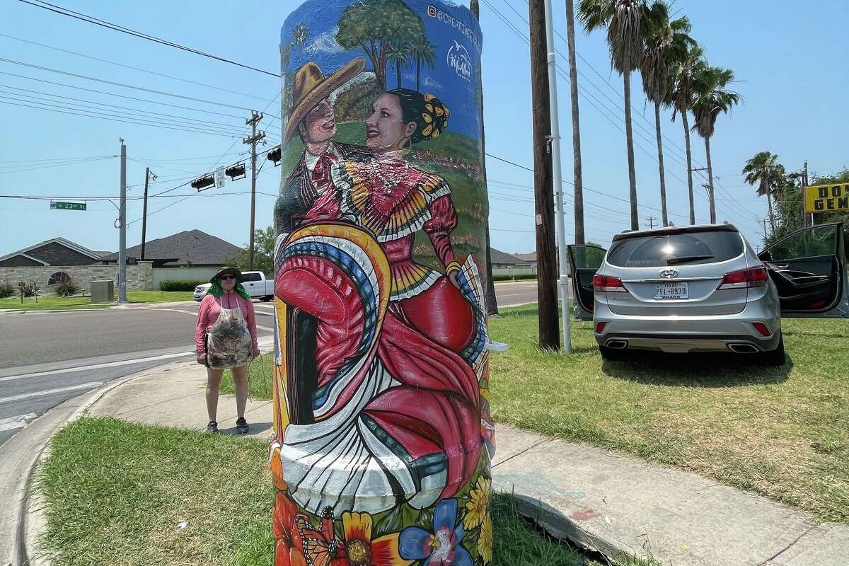 Artist Oneida Trevino and her mural, 'Folklorico Dancers at Quinta Mazatlan'
