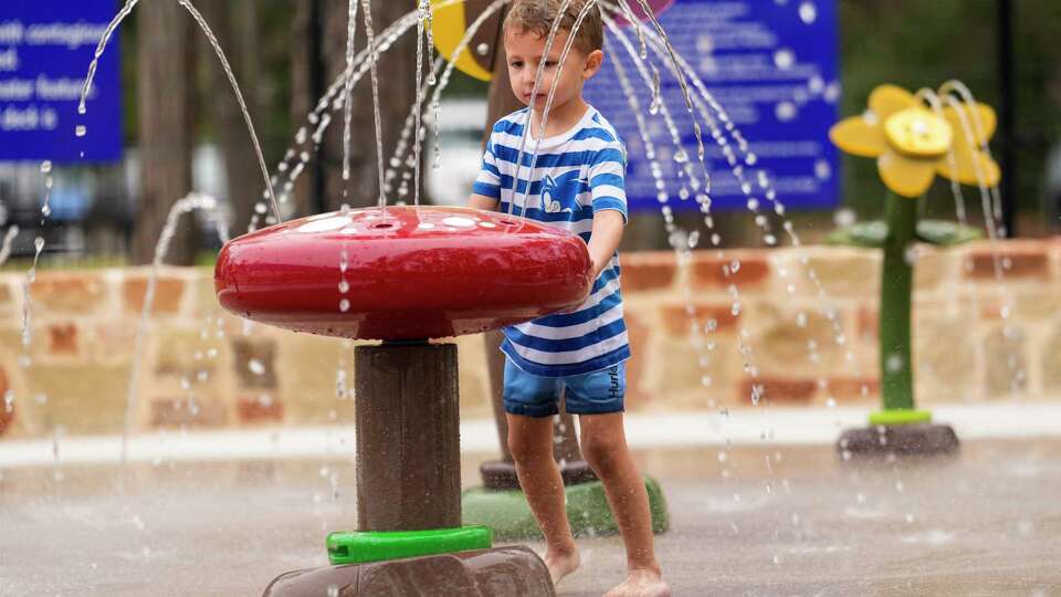 Levi Palomino, 4, plays in the new Bear Branch Sprayground during the opening of the new feature at the park on Thursday, Feb. 29, 2024 in The Woodlands. The $1.5 million, 4,000-square foot splashpad is up to five times the size of The Woodlands' six existing splashpads, Parks and Recreation Director John McGowan said, adding that it features 36 animal and nature themed water features for residents to cool off in the Texas heat. The water park will be open from 8 a.m. to 8 p.m. daily, starting March 1, through Oct. 31.