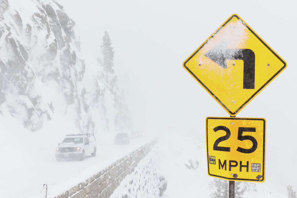 As epic snowfall covers Tahoe roads, chain installers provide traction