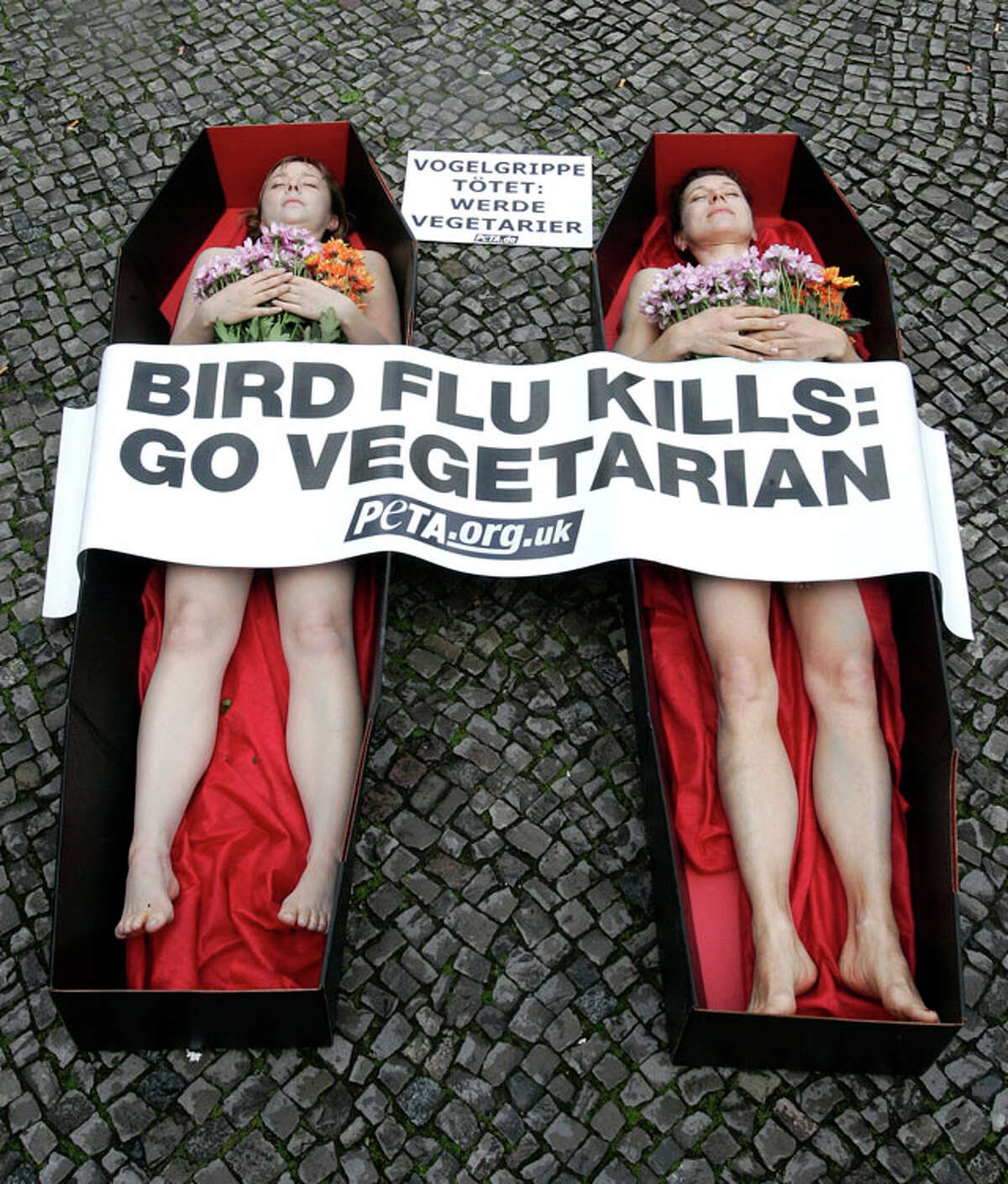 Photos: PETA protesters get nearly naked in Vancouver 