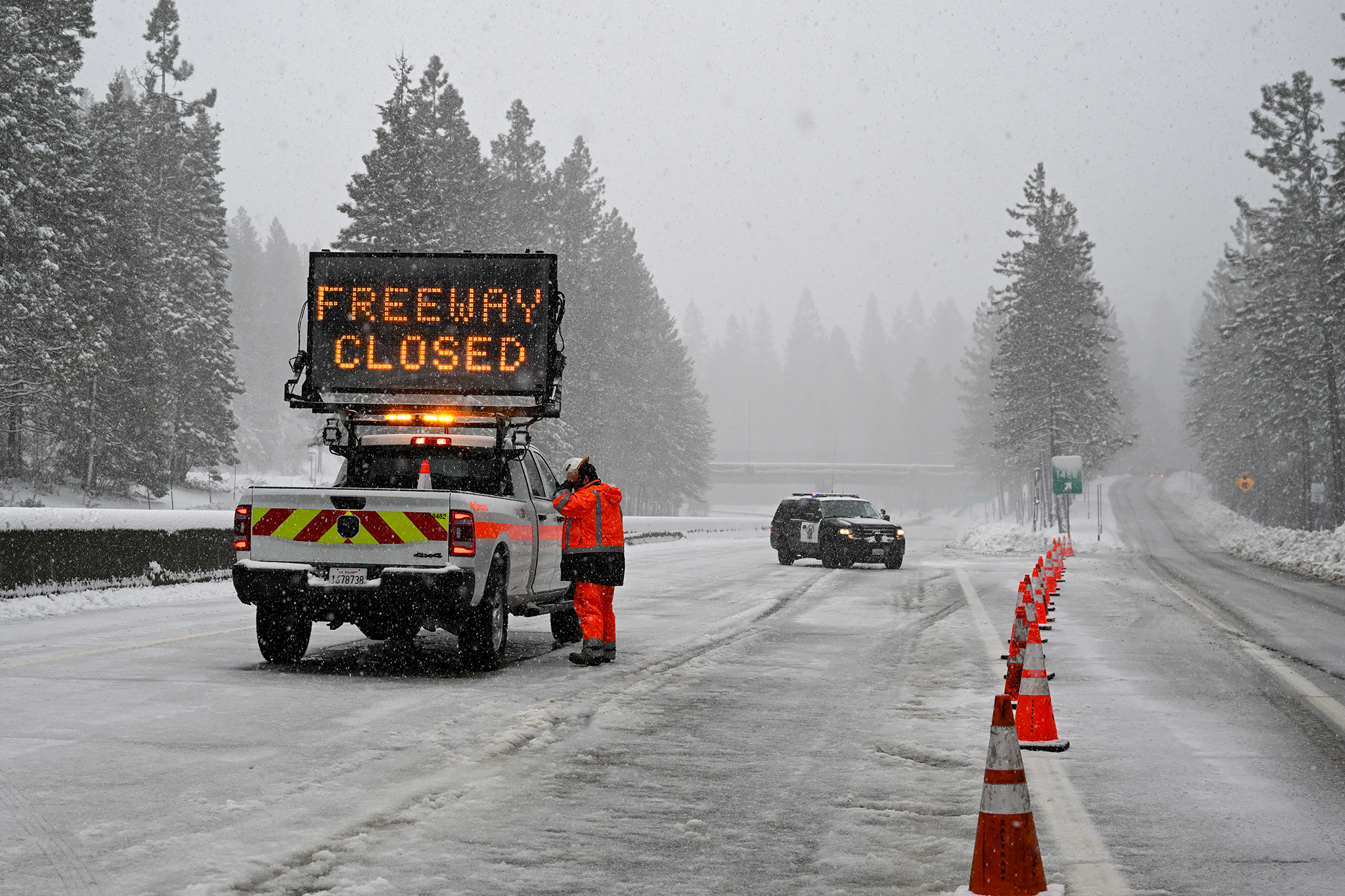 I-80 over Donner Pass closes as cars spin out on snowy highway