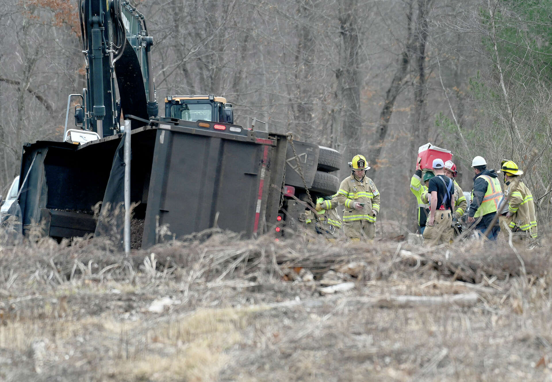 South Windsor dump truck crash causes fuel spill