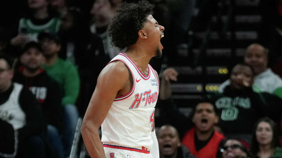Houston Rockets guard Jalen Green (4) reacts after making a basket and drawing a foul during an NBA basketball game at Toyota Center, Sunday, Jan. 21, 2024, in Houston.