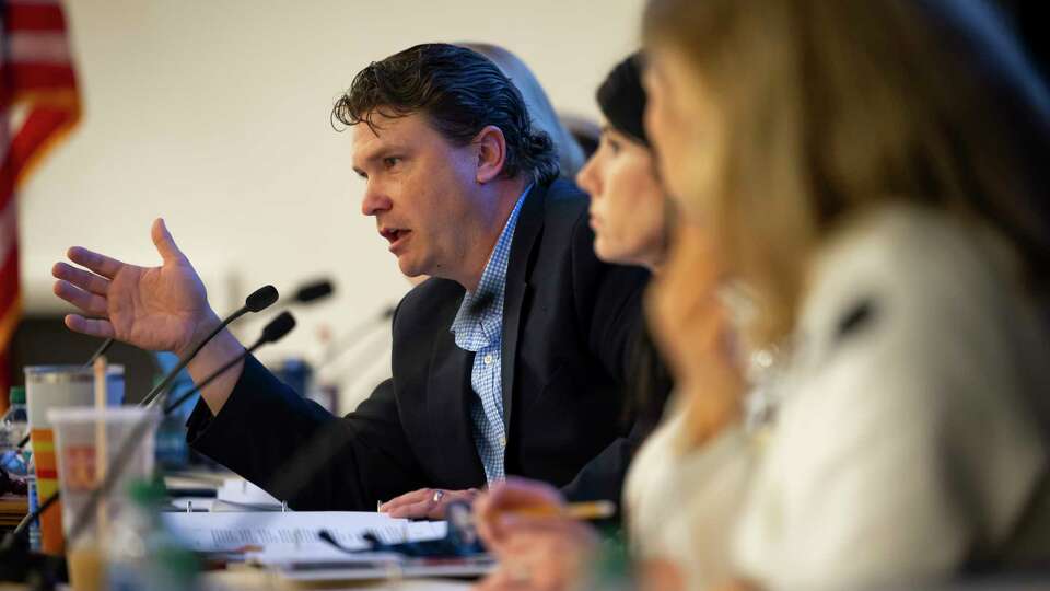 SBISD School Board President Chris Earnest responds to a public remark during a school board meeting on Monday, March 4, 2024, at the Duncan Klussmann Center.