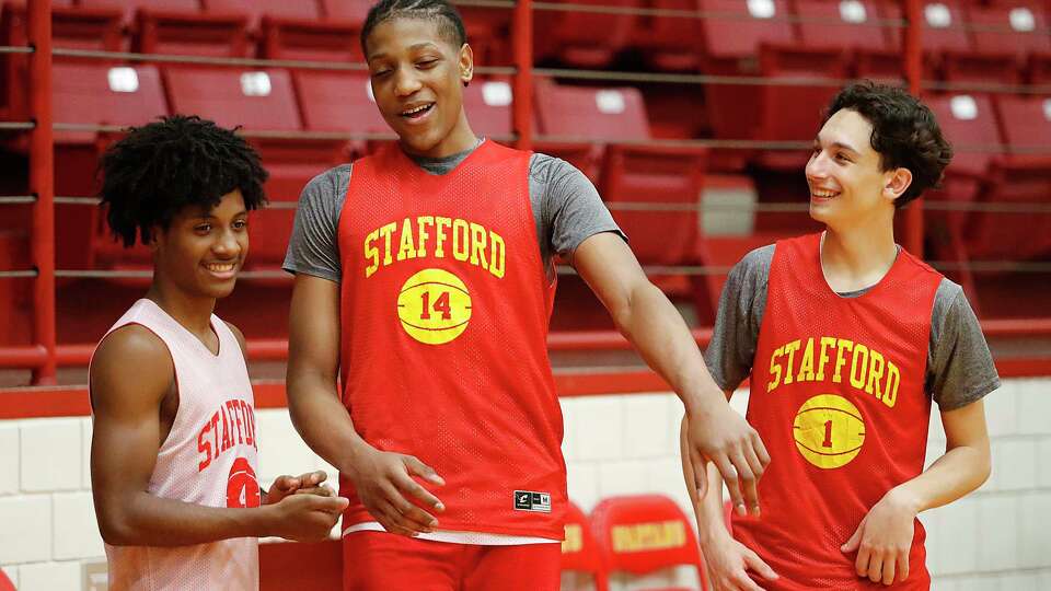 STAFFORD, TX -MARCH 5 :(L-R) Roosevelt Hawkins, Braden East and Maxwell Frels during practice at Stafford High School before heading to San Antonio this week to compete in the state tournament ,March 5, 2024 in Stafford,Texas.