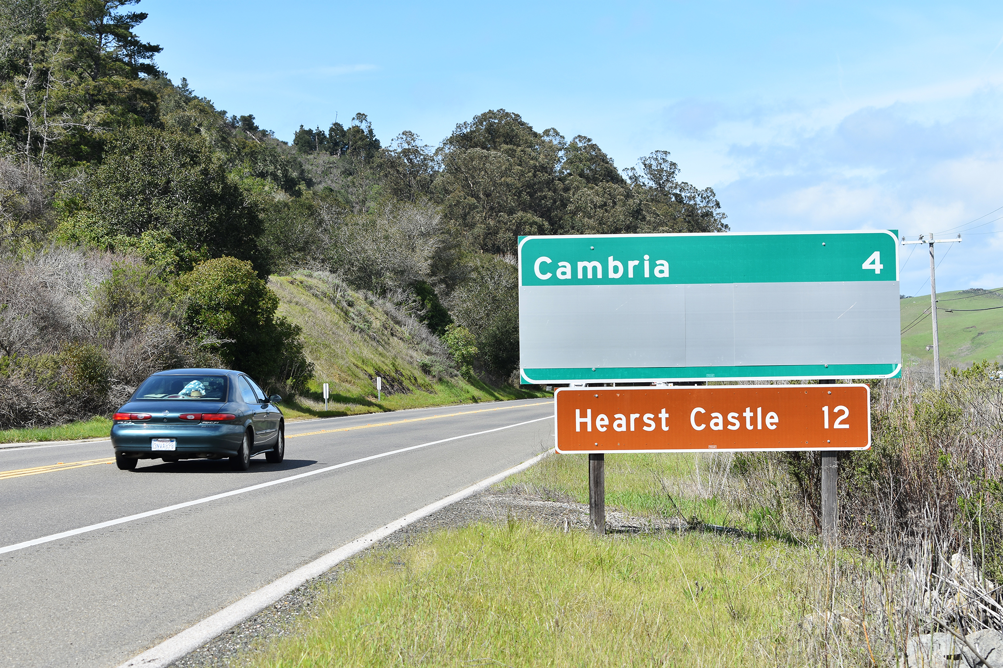 Some locals displeased as Caltrans covers up part of Highway 1 sign