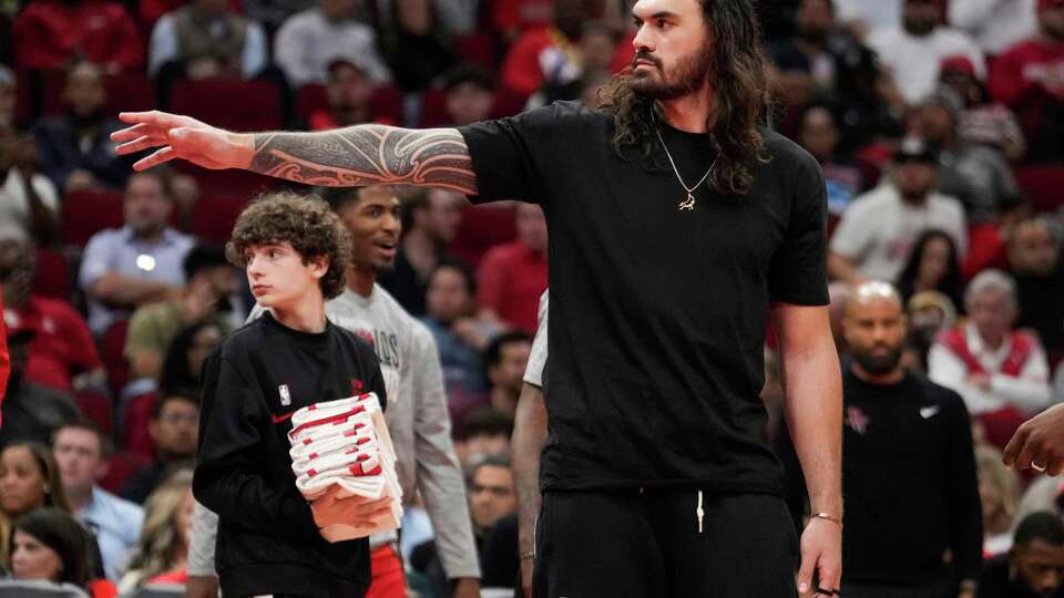 Houston Rockets center Steven Adams waves to fans during a time out in the second half of an NBA basketball game against the Los Angeles Clippers on Wednesday, March 6, 2024 in Houston.