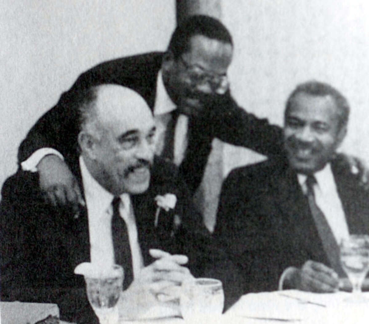 Elmo Willard, left, Judge John Paul Davis, and Thoedore Johns, Sr. at in banquet in Beaumont. Date unknown. Photo provided by Tyrrell Historical Library