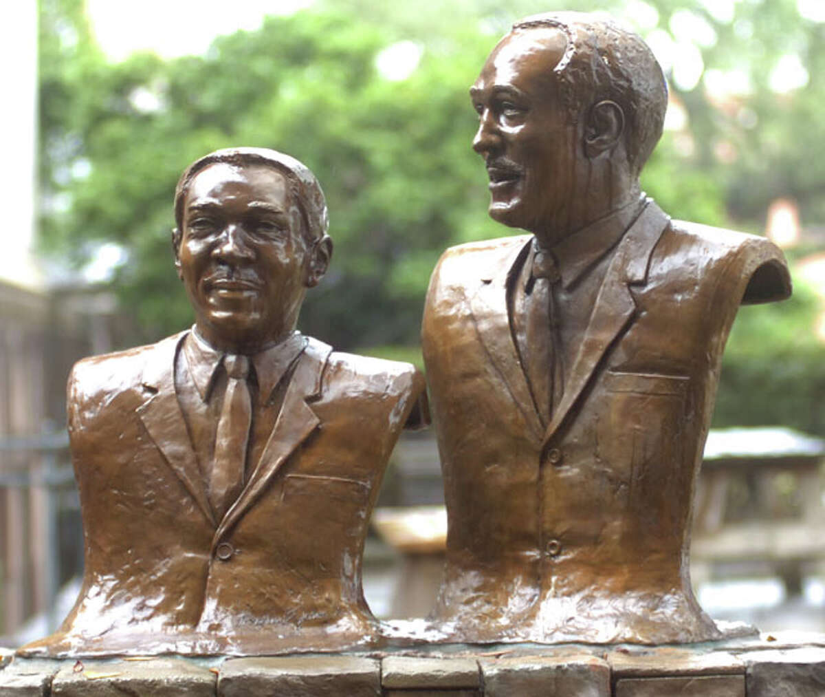 Busts of Theodore Johns, Sr., left, and Elmo Willard stand near the public entrance to the Jefferson County Courthouse. Pete Churton/The Enterprise
