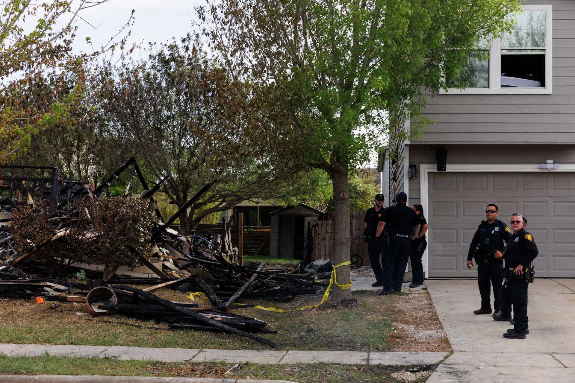 'It's crazy man': Neighbors mourn death of family killed in house fire