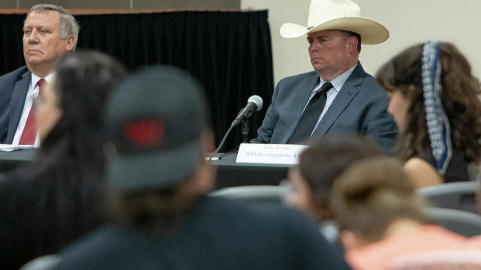 Austin-based investigator Jesse Prado, right, listens to families give public comment after delivering his investigative report on the Police Department's actions during the Robb Elementary School mass shooting on May 24, 2022 to the Ulvade City Council at SSGT Willie de Leon Civic Center on Thursday, March 7, 2024 in Ulvade, Texas.