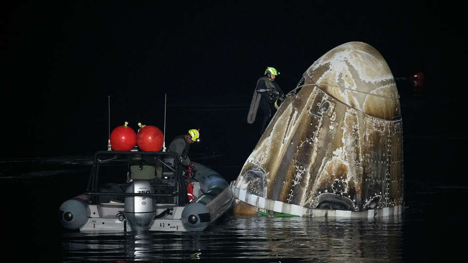 Support teams work around the SpaceX Crew Dragon spacecraft shortly after it landed with NASA astronaut Jasmin Moghbeli, European Space Agency astronaut Andreas Mogensen, Japan Aerospace Exploration Agency astronaut Satoshi Furukawa and Roscosmos cosmonaut Konstantin Borisov aboard in the Gulf of Mexico off the coast of Pensacola, Florida, Tuesday, March 12,2024. Photo Credit: (NASA/Joel Kowsky)