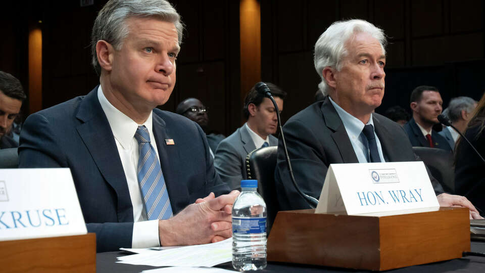 FBI Director Christopher Wray, left, and CIA director William Burns attend a hearing of the Senate Intelligence Committee on Capitol Hill, Monday, March 11, 2024, in Washington. (AP Photo/Mark Schiefelbein)