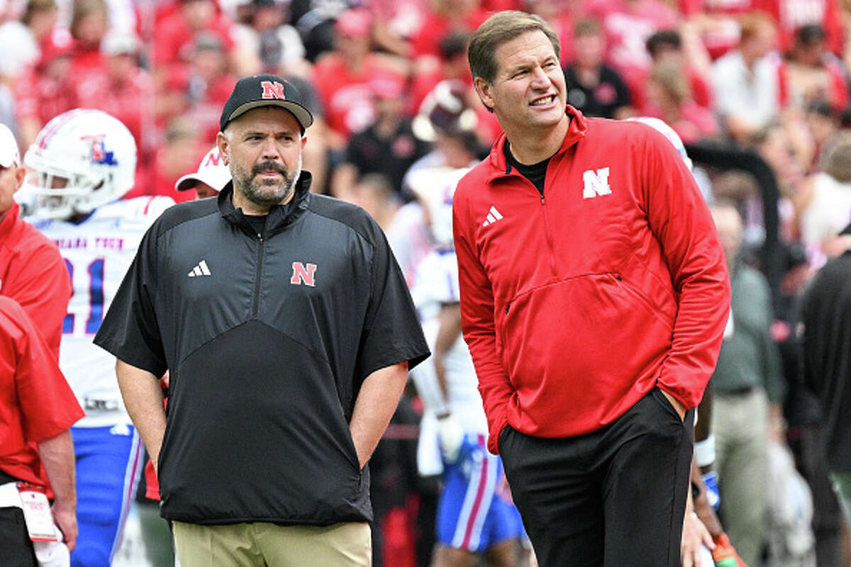 Head coach Matt Rhule of the Nebraska Cornhuskers and athletic director Trev Alberts meet on the field before the game against the Louisiana Tech Bulldogs at Memorial Stadium on September 23, 2023 in Lincoln, Nebraska. 