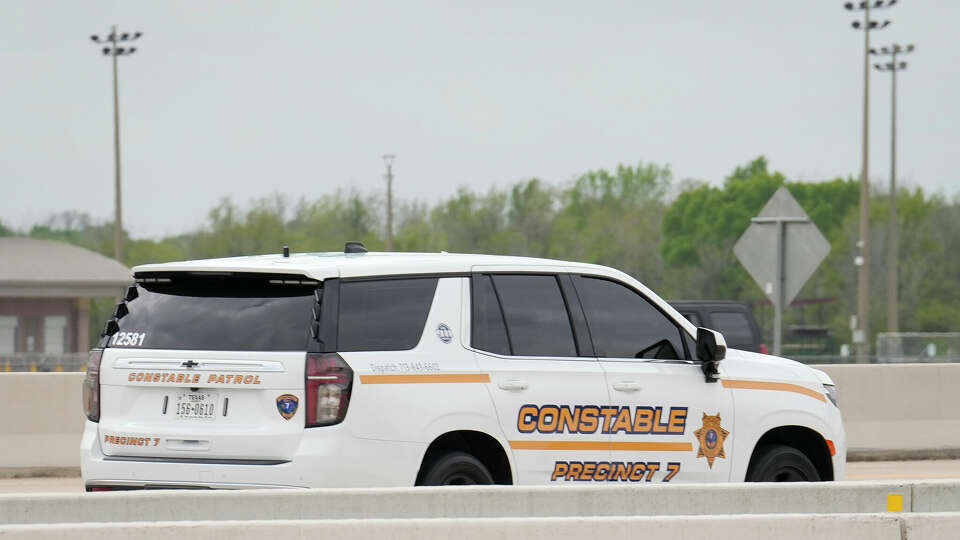 A Harris County Constable Precinct 7 patrol car drives by Sam Houston Tollway — also known as Beltway 8 —near Blackhawk Boulevard Wednesday, March 13, 2024 in Houston. The Harris County Toll Road Authority pays for about 160 deputy constables to patrol the 90-mile Sam Houston Tollway.