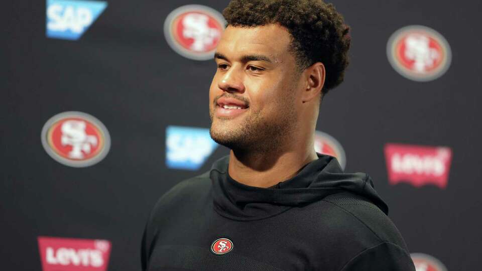 San Francisco 49ers' Arik Armstead speaks to the media after practice at training camp in Santa Clara, Calif., on Wednesday, July 26, 2023.