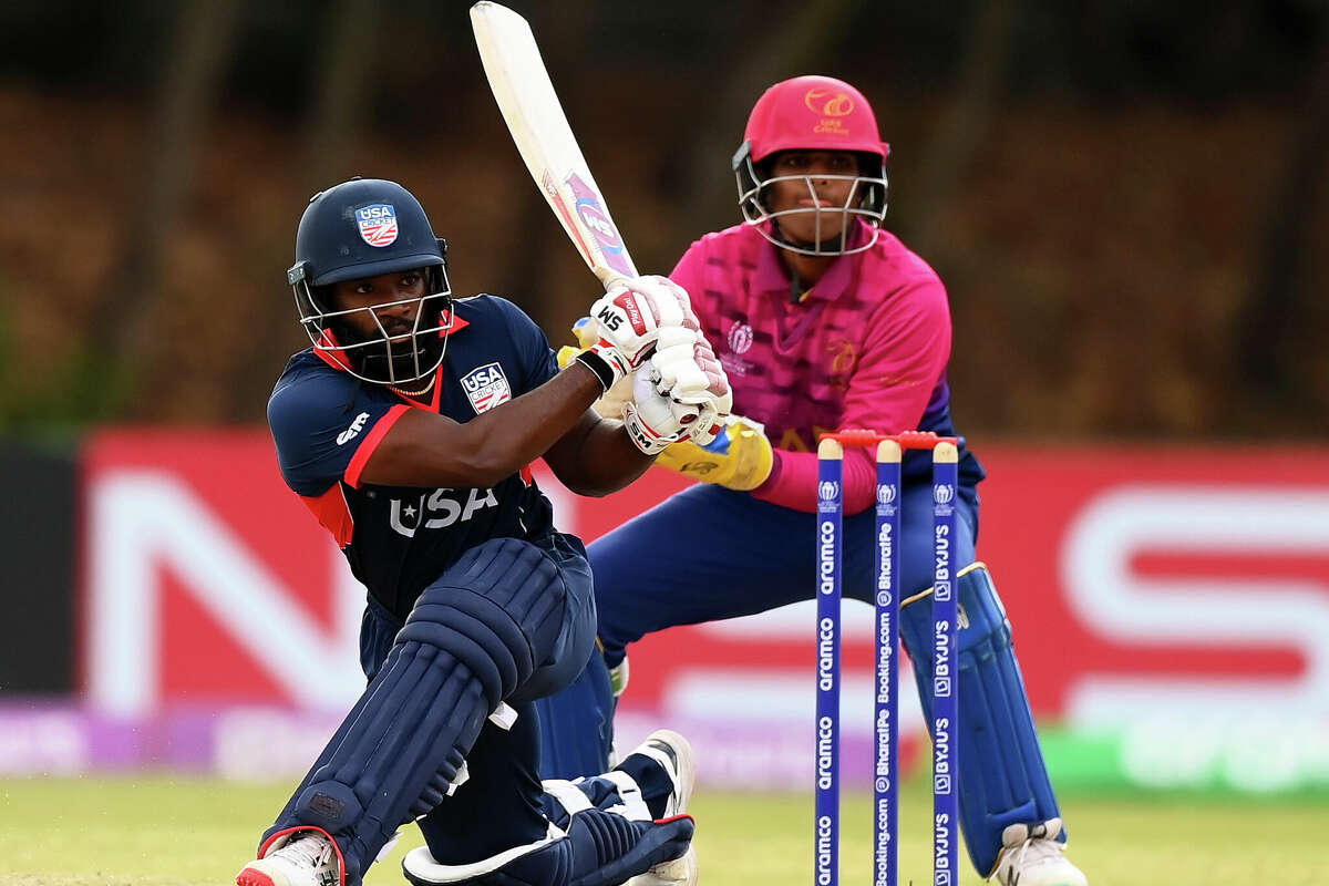 HARARE, ZIMBABWE - JULY 06: Aaron Jones of USA plays a shot as Aryansh Sharma of UAE keeps during the ICC Men's Cricket World Cup Qualifier Zimbabwe 2023 9th and 10th Playoff match between USA and UAE at Takashinga Cricket Club on July 06, 2023 in Harare, Zimbabwe. (Photo by Alex Davidson-ICC/ICC via Getty Images)