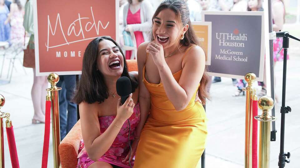 Twins Elysa Cortez, left, and Elyse Cortez, laugh during an interview before they find out what residency training programs they will match with on match day, Friday, March 15, 2024 at McGovern Medical School at UTHealth Houston.