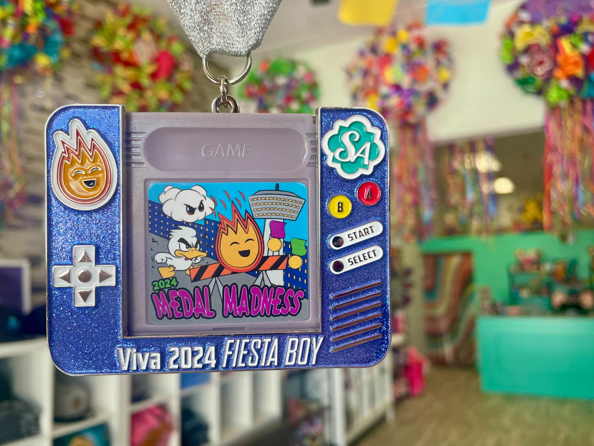 Playable Game Boy Fiesta medal being sold by SA Flavor