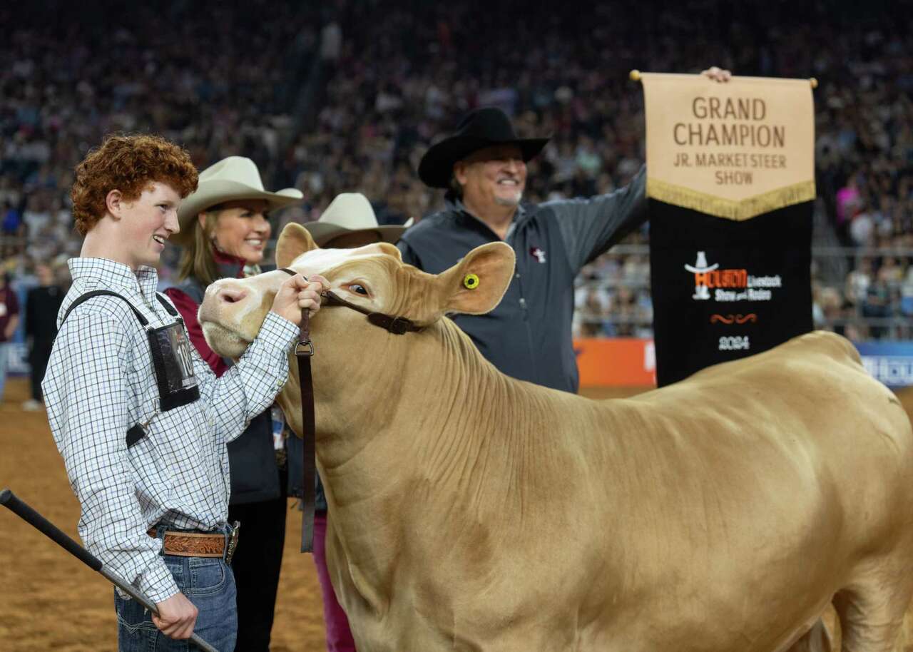 Blaize Benson reacts after his steer was named grand champion during the Junior Market Steer Selection at the Houston Livestock Show and Rodeo at NRG Stadium, Friday, March 15, 2024, in Houston.