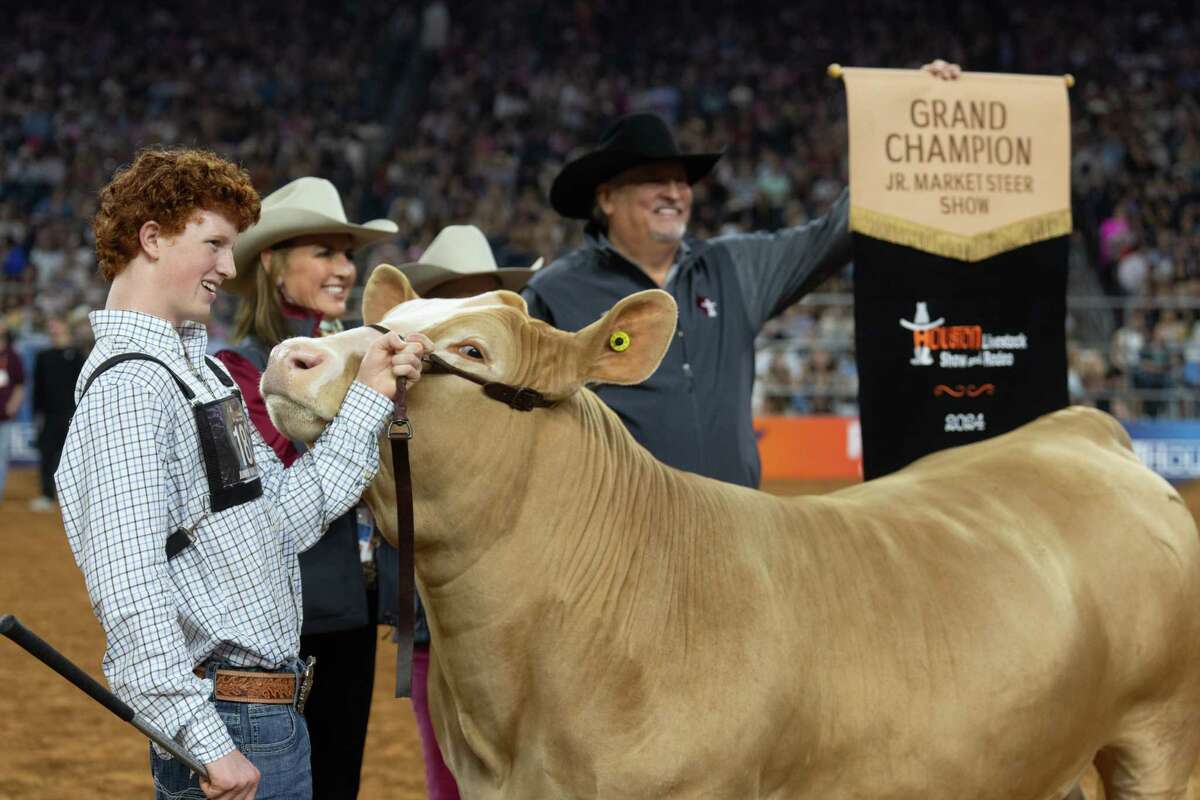 Blaize Benson reacts after his steer was named grand champion during the Junior Market Steer Selection at the Houston Livestock Show and Rodeo at NRG Stadium, Friday, March 15, 2024, in Houston.