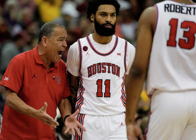 Houston head coach Kelvin Sampson talks to his players during the first half of an NCAA college basketball game against Iowa State in the championship of the Big 12 Conference tournament, Saturday, March 16, 2024, in Kansas City, Mo.