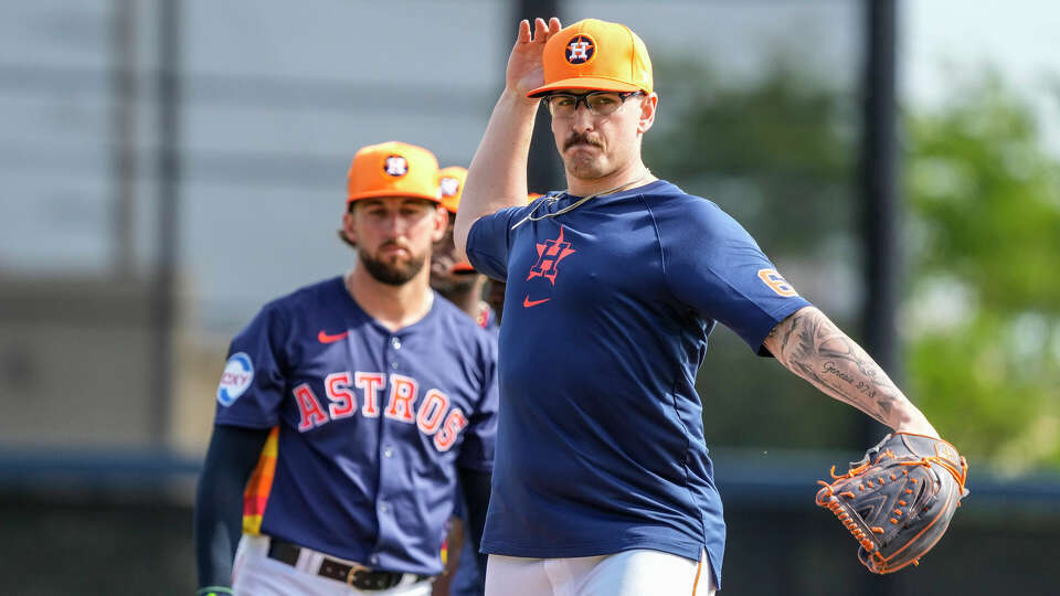 Houston Astros pitcher J.P. France works on a PFP drill during workouts for Astros pitchers and catchers at CACTI Park of the Palm Beaches on Saturday, Feb. 17, 2024, in West Palm Beach, Fl.