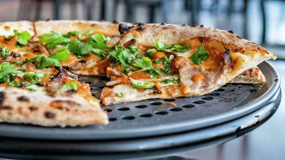 Carnitas pizza is on the menu Monday 18, 2024, at Pizzana, 2029 West Gray St., with traditional Neapolitan pizza, pasta, salads and deserts in Houston.