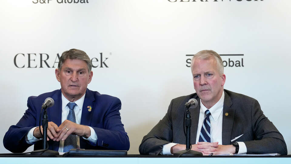 U.S. Sen. Joe Manchin, left, and U.S. Sen. Daniel Sullivan calling for the Biden administration to end the LNG permitting pause during a press conference at CERAWeek by S&P Global Monday, March 18, 2024 at Hilton Americas-Houston in Houston.