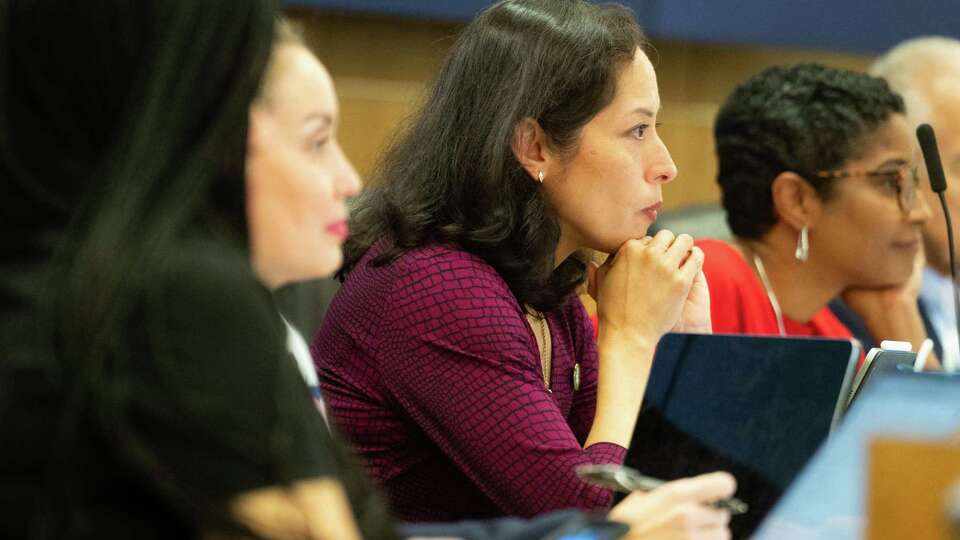 Janette Garza Lindner, board member with the Houston ISD Board of Manager, listens during a Houston ISD Board of Managers meeting at the Hattie Mae White Educational Support Center, Thursday, March 21, 2024, in Houston.