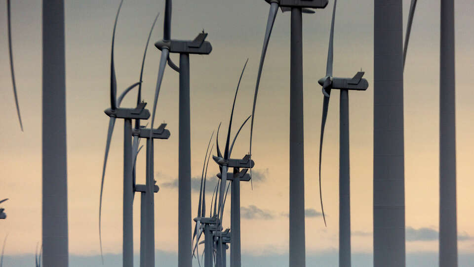 Wind turbines spin Tuesday, March 2, 2021 near Raymondville in the Rio Grande Valley in far south Texas.