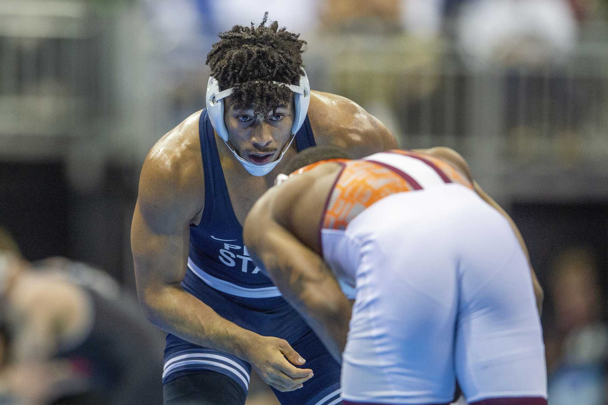 3time champ Starocci tops exchamp Lewis to reach semis at NCAA
