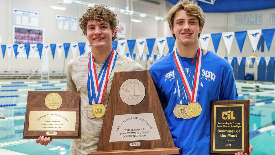 From Left, Friendswood High School seniors Tony Laurito and Marshall Odom pose for a photo, Thursday, March 21, 2024 in the school natatorium after being selected All-Greater Houston Boys Swimmers of the Year.