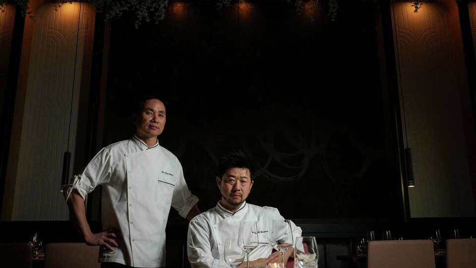 Chefs Ho Chee Boon, left, and Hideki Hiwatashi pose for a portrait Monday, March 25, 2024, at Molihua in Houston.