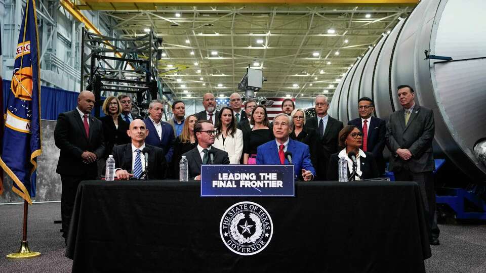 Texas Governor Greg Abbott visits NASA's Johnson Space Center to announce the inaugural members of the Texas Space Commission Board of Directors and the Texas Aerospace Research and Space Economy Consortium Executive Committee alongside Rep. Greg Bonnen, Speaker Dade Phelan and NASA's Johnson Space Center Director Vanessa Wyche on Tuesday, March 26, 2024, in Houston .