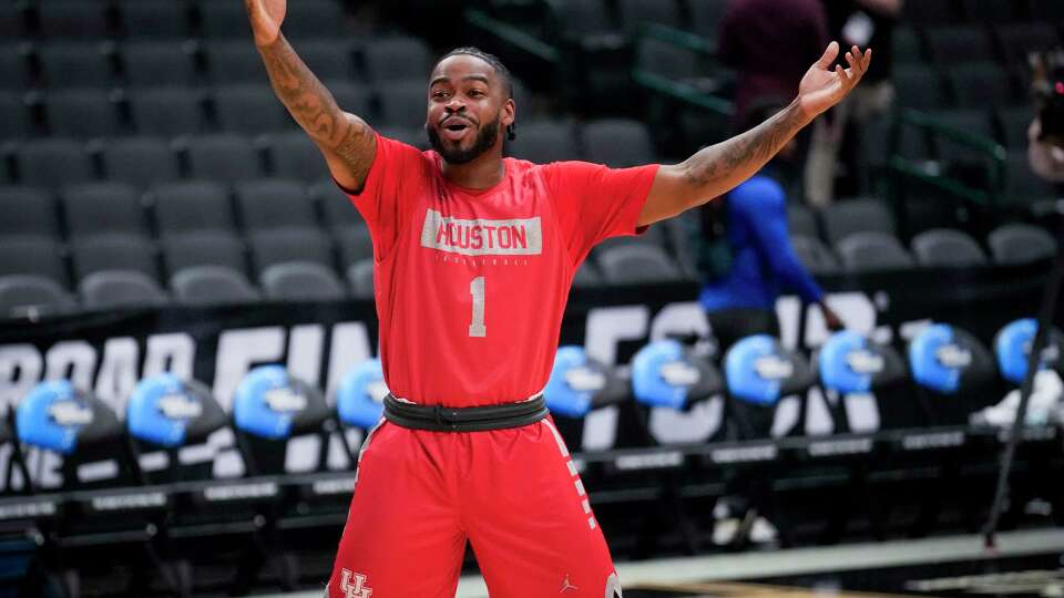 Houston Cougars guard Jamal Shead (1) calls for the ball to start the Cougars' practice session for a Sweet 16 men's college basketball game in the NCAA Tournament on Thursday, March 28, 2024, in Dallas.