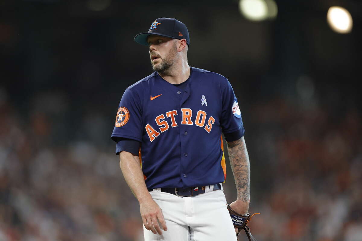 Ryan Pressly of the Houston Astros walks to the dugout during the ninth inning against the Cincinnati Reds at Minute Maid Park on June 18, 2023 in Houston, Texas. 