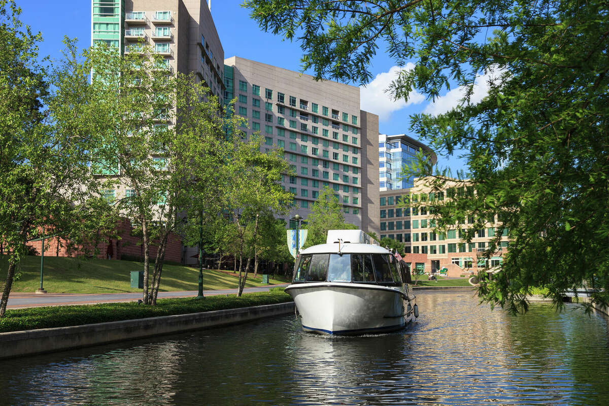 A public water taxi motors it way through the Woodlands Waterway in suburban Houston, Texas.